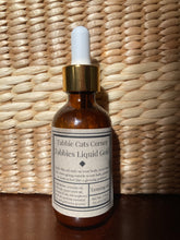 Load image into Gallery viewer, Tabbie’s Liquid Gold Tanning Oil